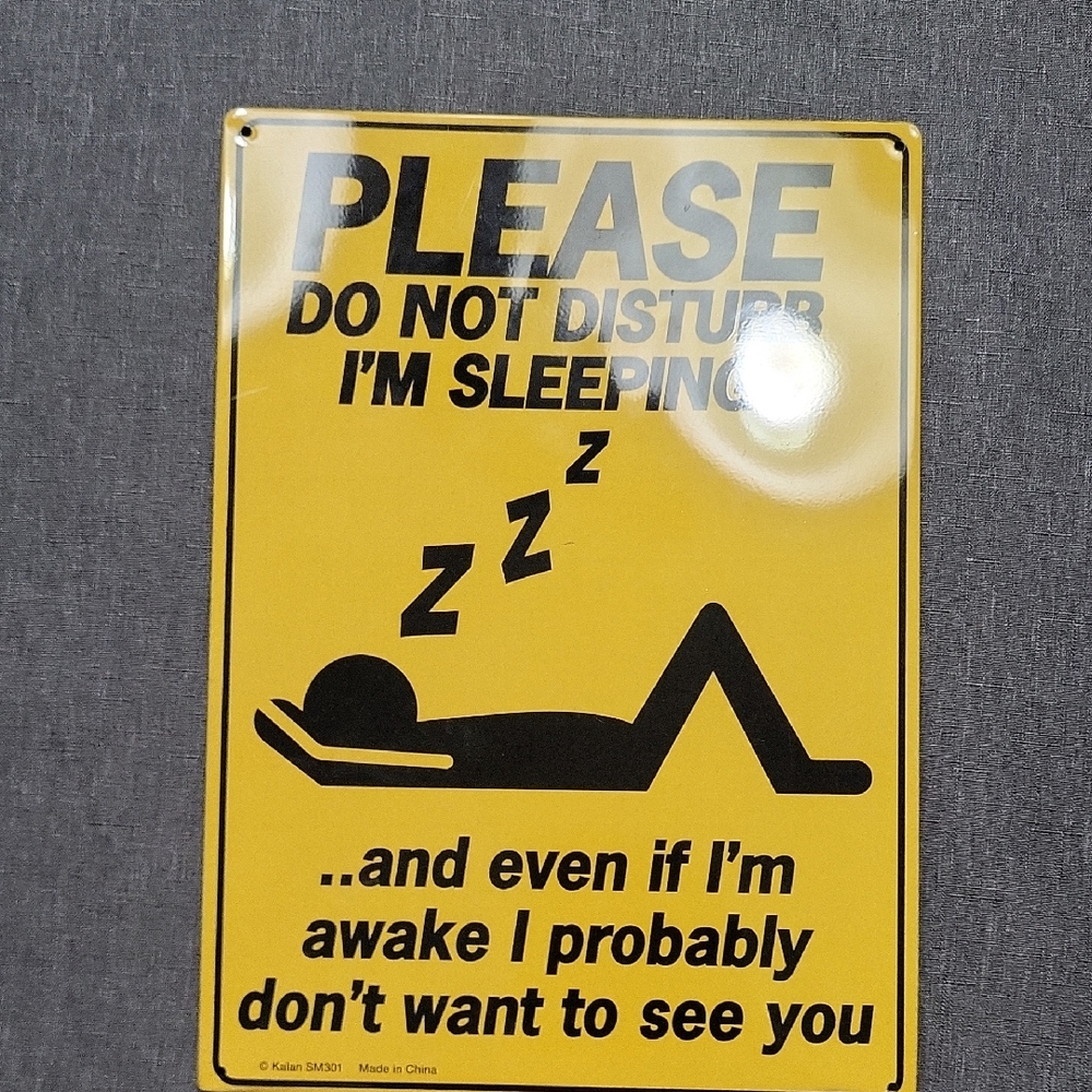 Yellow 'Do Not Disturb' Sign